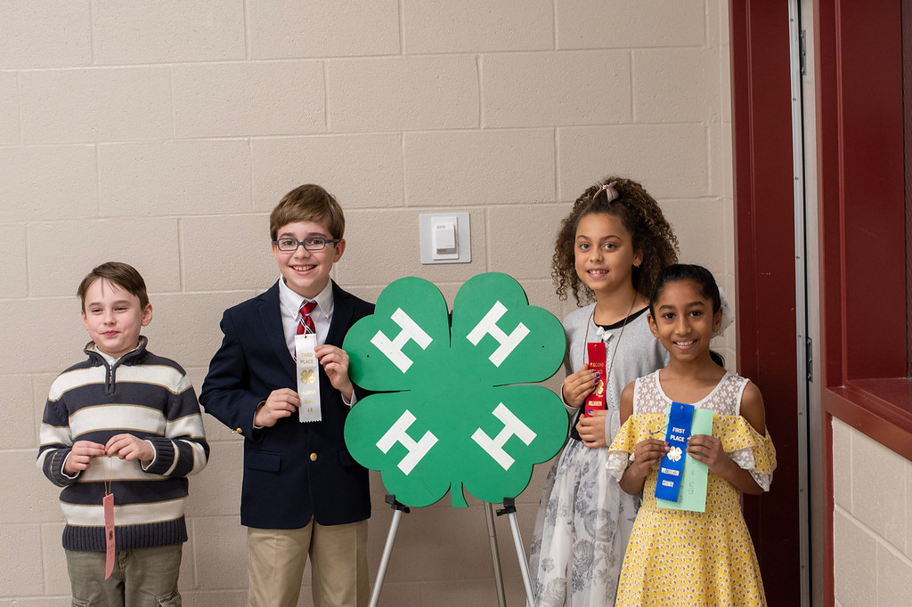 Children with ribbons from 4-H public speaking contest