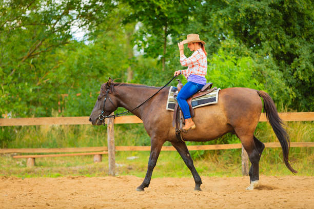 woman riding a horse