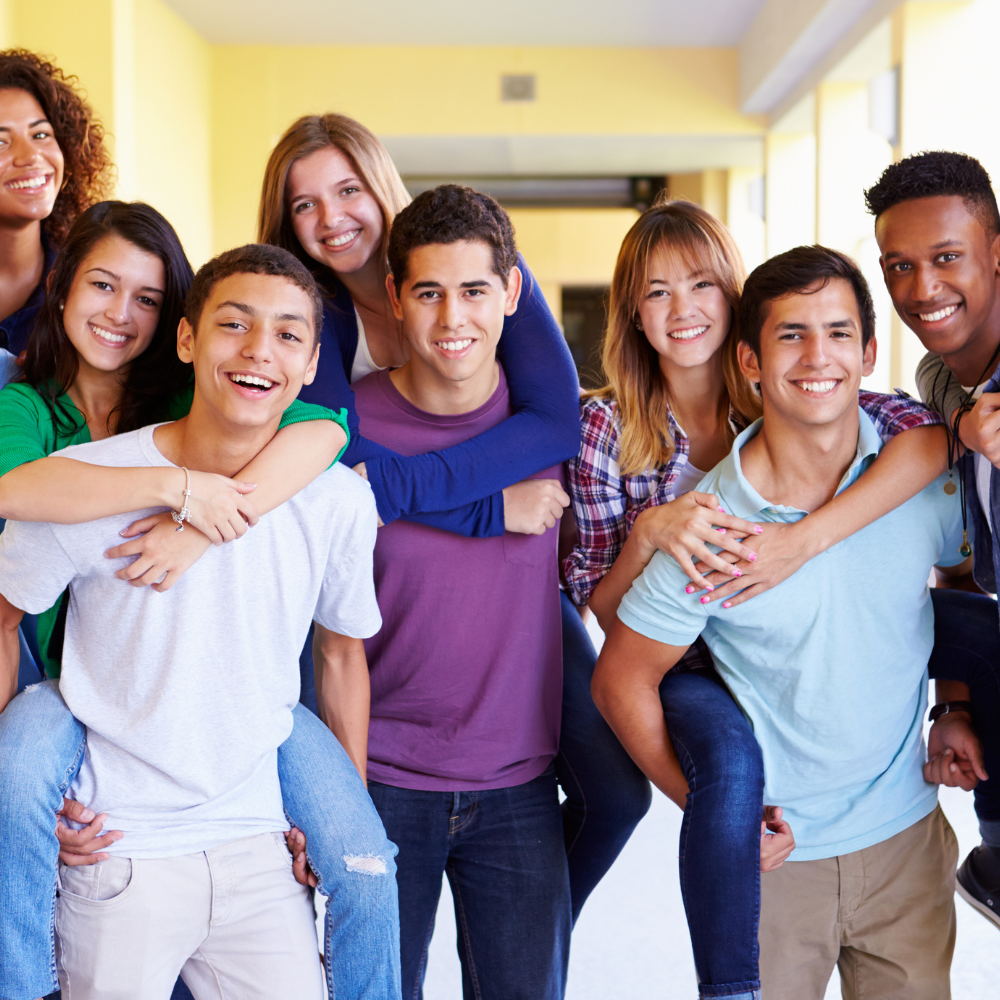 Students posing for a photo in casual clothes