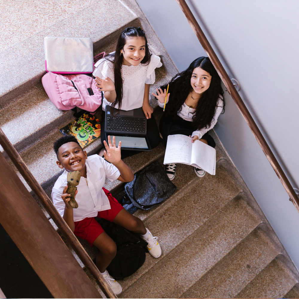 Kids studying on the school staircase