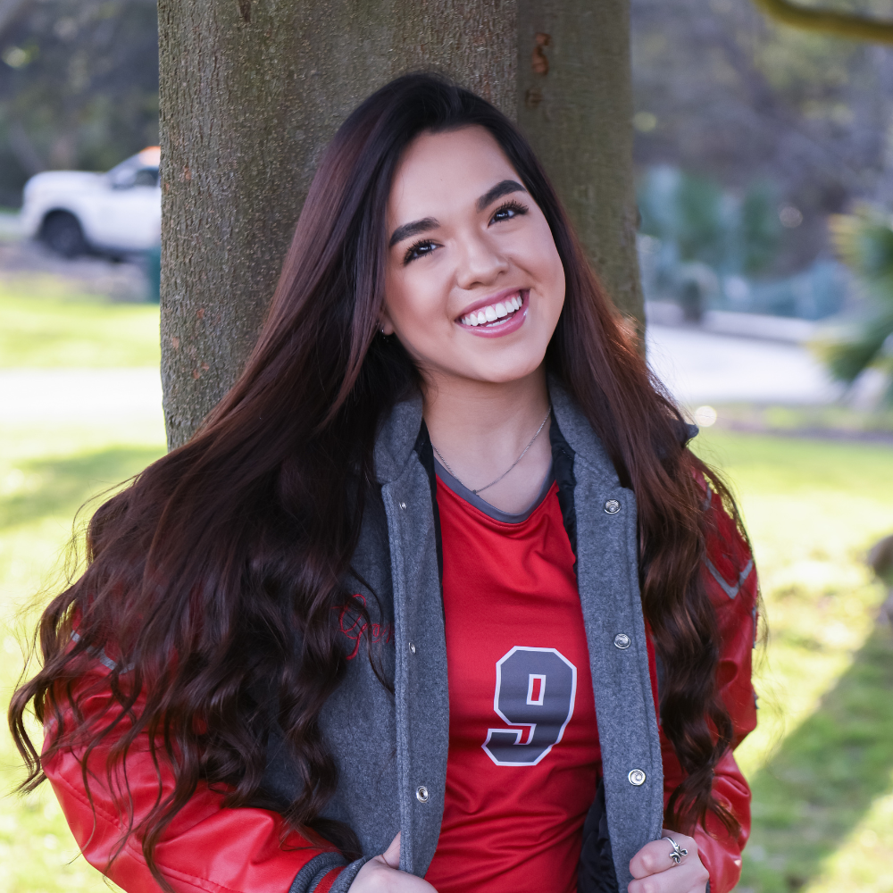 A senior in her red lettermans jacket