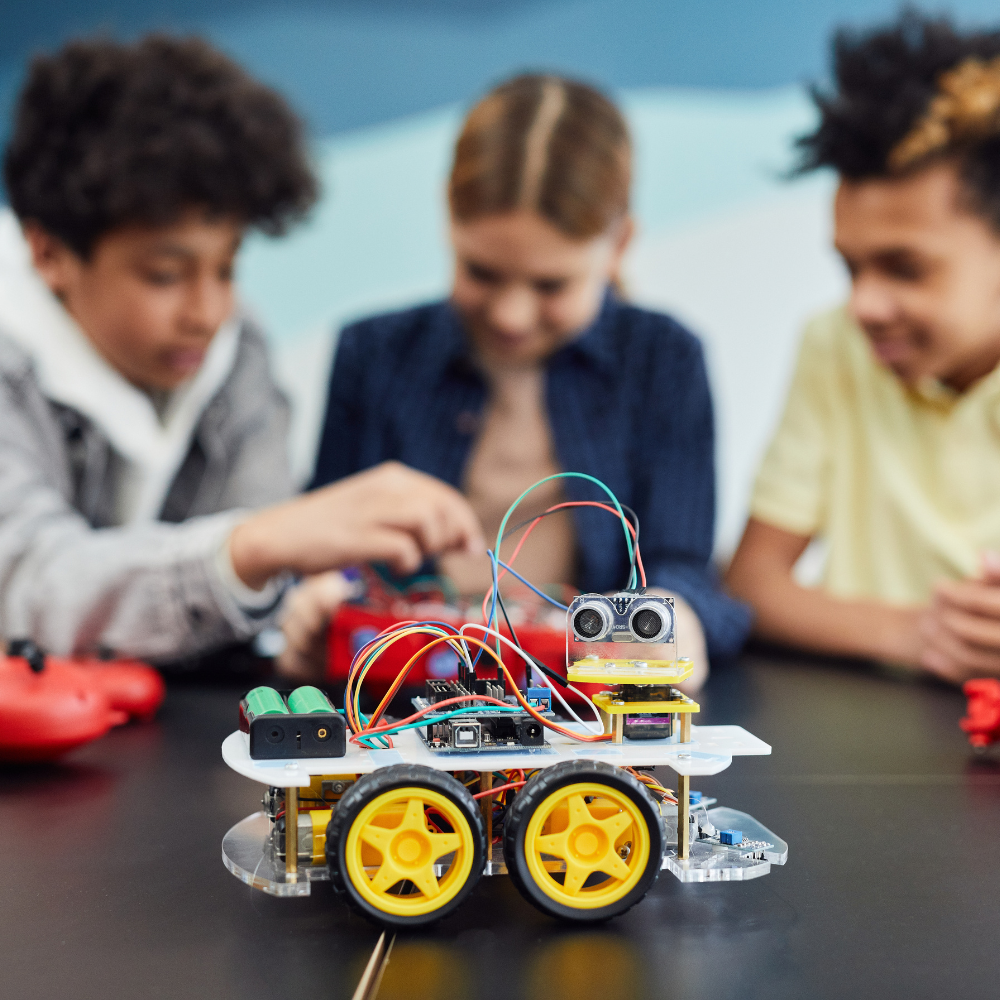 kids working together to create a LEGO robot